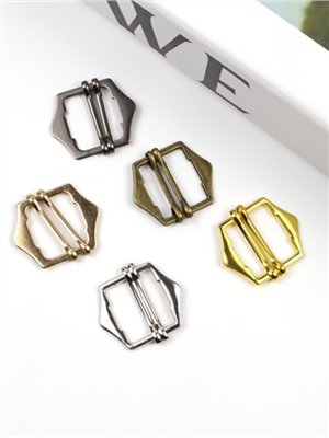 Strap adjustment buckle