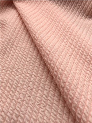 Snake like ribbed jacquard knitted fabric