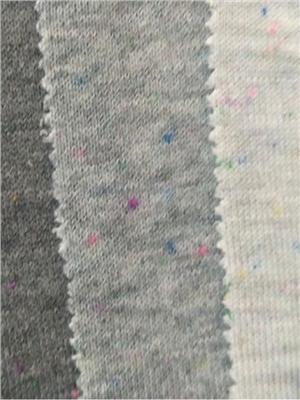 Color dot fish scale looped knitted fabric