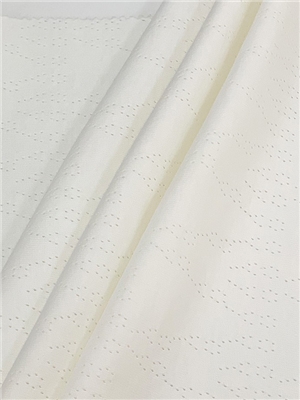 Geometric perforated and looped knitted fabric